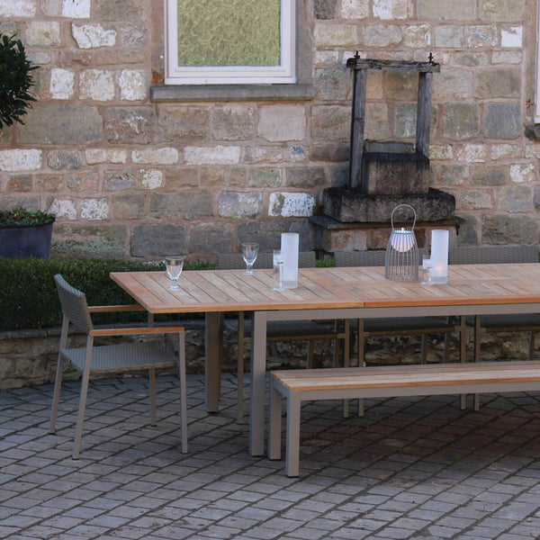 Atlantic Outdoor Teak Dining Table, Reclaim Bench and Modena Dining Chairs close up