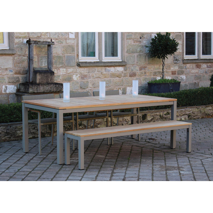 Atlantic Outdoor Teak Dining Table, Reclaim Bench and Modena Dining Chairs in Kubu grey